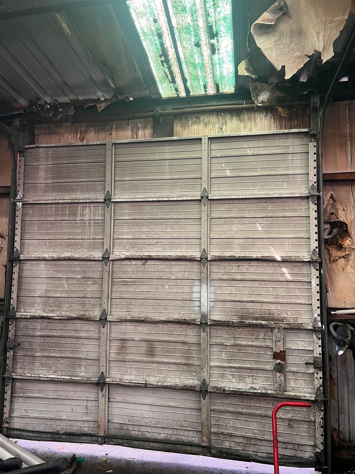 Worn garage door replacement